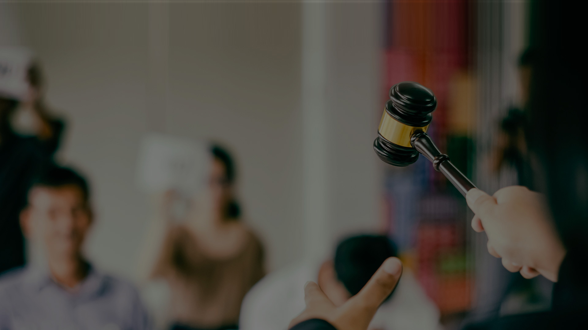 Photo of gavel in an auction room