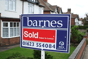 Customer talking to estate agent